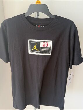 Jordan Black Short-Sleeve Tee with Yellow Jumpman and Red 23 Patch